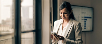A women reading something on her phone