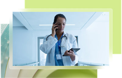 A doctor holding a tablet and talking on the phone.