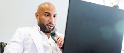 A man talking on a phone.