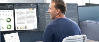 A person looking on the desktop screen