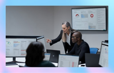 A group of three people discussing 