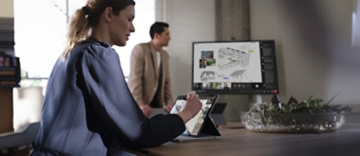  person using a stylus on a tablet