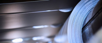 Stainless steel roll in processing machine.