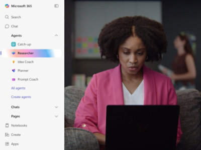 A woman in a pink blazer looks focused while working on her laptop with the Microsoft 365 Agents menu open.