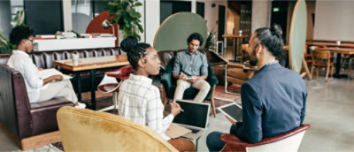 A group of people sitting in a circle