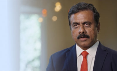 A man wearing a suit and tie