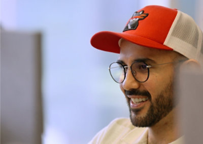 A man wearing red hat