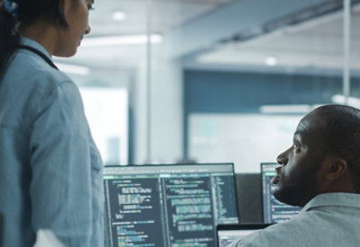 Two persons talking to each other