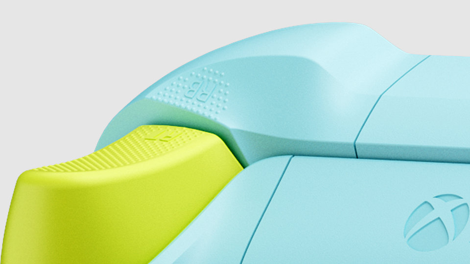 Close-up of the textured triggers and bumpers on the Xbox Wireless Controller – Sunkissed Vibes OPI Special Edition.