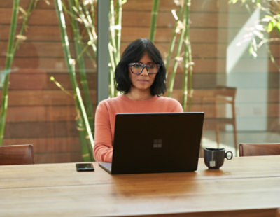 People sitting at desks in a room