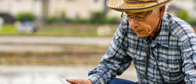 A man wearing a hat and glasses.