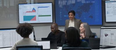 A group of people in a meeting