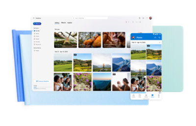 A tablet and a smartphone displaying a photo gallery app with various landscape and personal photos. 
