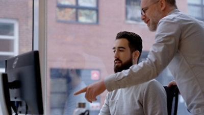 A person showing something on screen