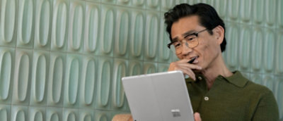 A man holding a tablet.