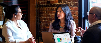 A man and a woman sitting at a table.