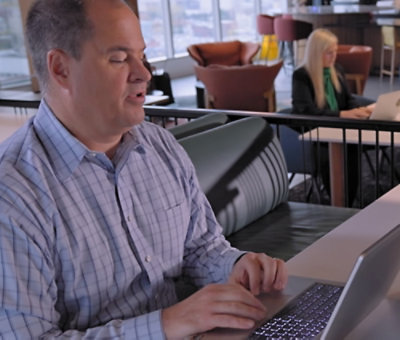 Person working on laptop.