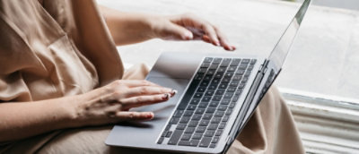 A person using a laptop.