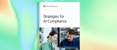 Muškarac i žena gledaju u laptop