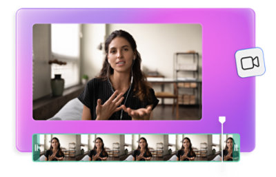 Seorang wanita berambut panjang, mengenakan earphone, memberi isyarat dengan tangannya sementara berbicara dalam panggilan video.