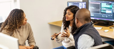 A group of people sitting in a room