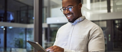 Two people discussing while looking at the laptop