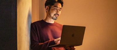 A man working with laptop.