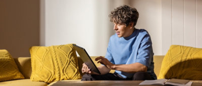 A man working with laptop.
