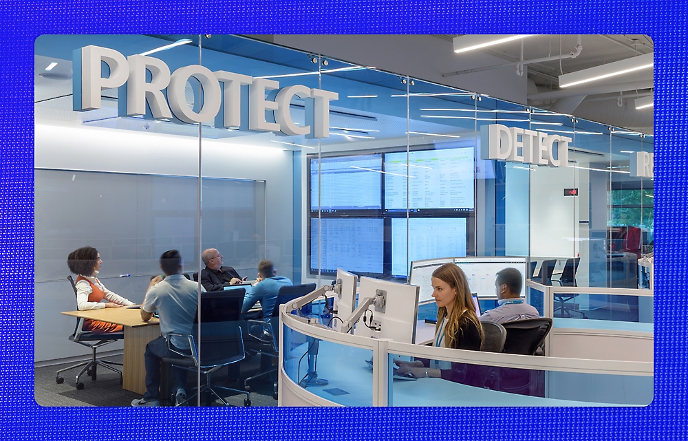 Image of people working at the office environment