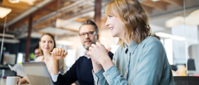 People sitting around a table and discussing