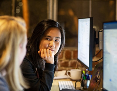 Person working at computer desk