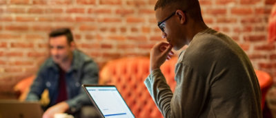 Person using tablet in workspace