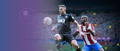 A group of men playing football.