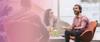 A group of people sitting in a room.