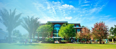 A building with trees in front of it.
