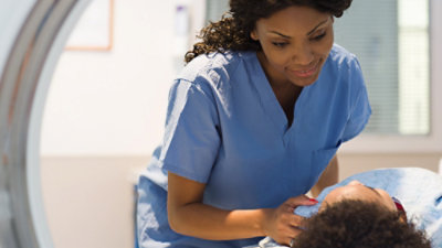 A doctor looking at a patient.
