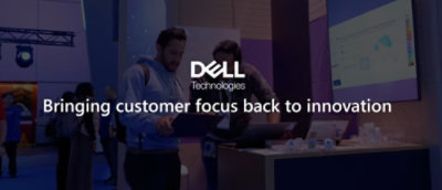 Two man working on laptop with Dell text