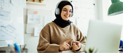 A woman using laptop.
