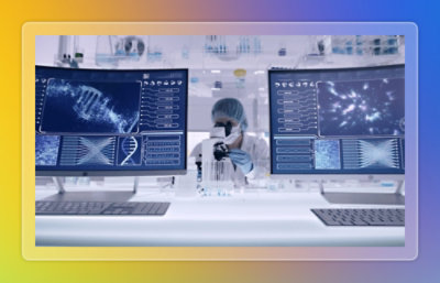 Medical workstation displaying diagnostic data and imaging results on dual screens.