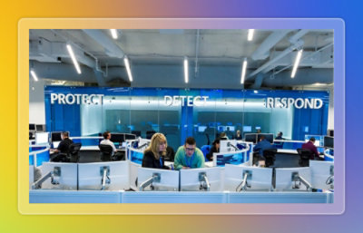 Team working on large screens