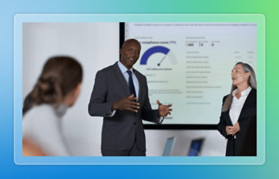 A man in a suit giving a presentation.