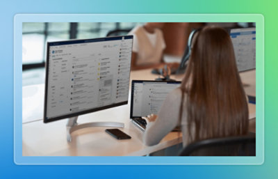 A person sitting at a desk working on a computer.