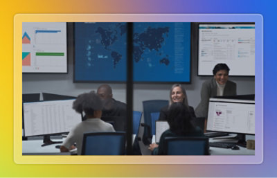 An office with employees working on their computers.