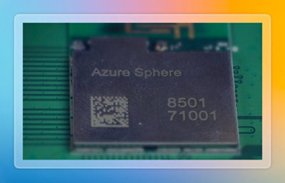 Close-up of an Azure Sphere chip mounted on a circuit board.