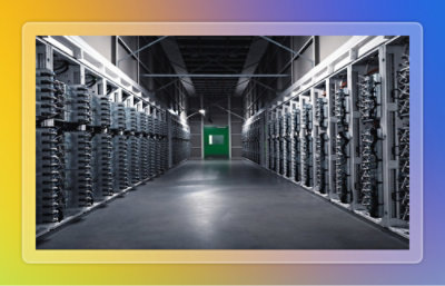 A long hallway with rows of computer servers.