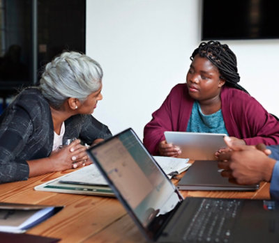 People having a conversation in a meeting