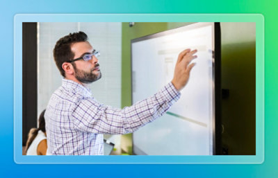 Person using interactive display.