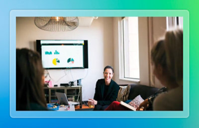 Team meeting with dashboard screen.