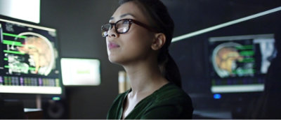 Person analyzing data screens