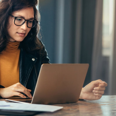A women working on laptop.